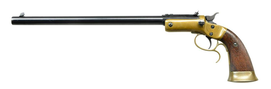 STEVENS SINGLE SHOT TARGET PISTOL.: Cal. 22 CF. S#. 8788. Bbl. 12". Interesting Stevens target pistol incorporating features of several models. Bbl. has been rechambered & right flat stamped "22 CF 1864". Brass frame w/ sideplate, trigg