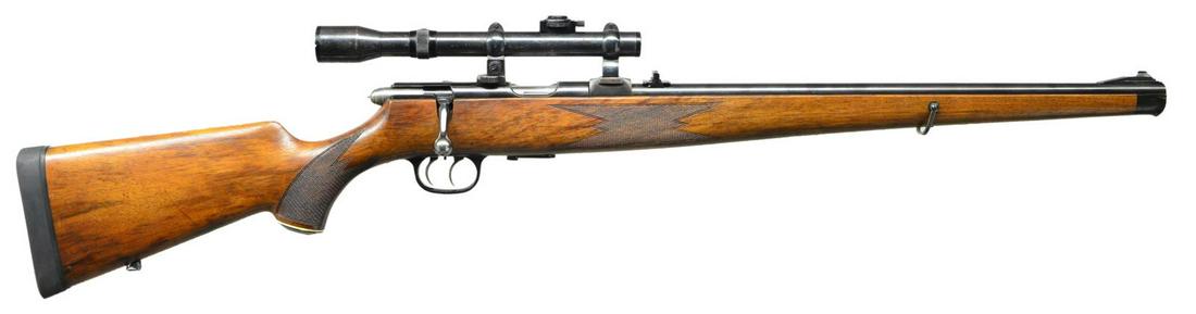 KRICO BOLT ACTION SPORTER RIFLE.: Cal. 22 LR. S# 6391. Bbl. 20 1/2". Appears very similar to the Model 320 but this example is not marked w/ any model number. Fixed ramp front, two leaf folding rear sights & claw mounts atop the recei