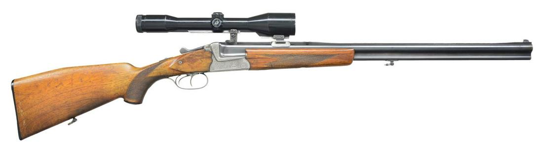 GERMAN JP SAUER & SOHN O/U COMBINATION GUN.: Cal. 16 Ga., 2 3/4" / 5.6x50R Mag. S# 11460 (12 63= Dec. 1963). The import marked 25 5/8" bbls. have matted rib, bead front & flip up rear sight. Claw mounts on bbl. hold Zeiss 6x42 scope w/ German po