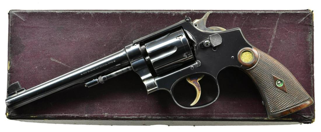 SMITH & WESSON M&P TARGET REVOLVER.: Cal. 38 Special. S# 235916. Bbl. 6". Square cut front & adjustable rear sights. Factory refurbishment "*" on butt w/ matching S# on butt, cylinder & bottom of barrel. Yoke & crane marked "296". Six sh