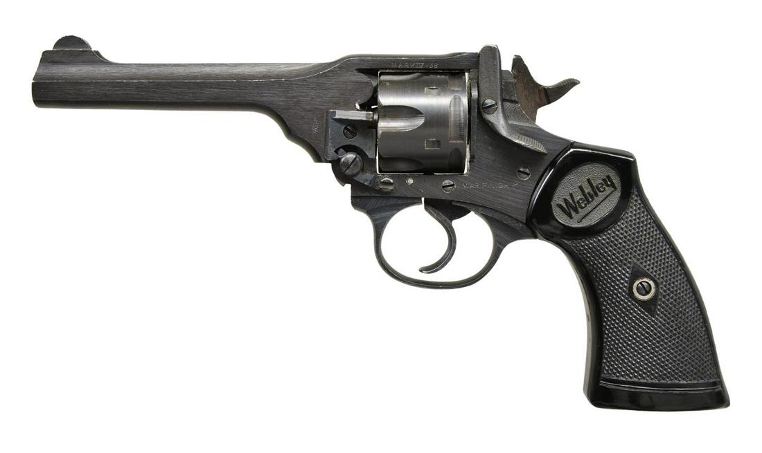WWII ERA WEBLEY MK IV REVOLVER.: Cal. .38 S&W. S# 131648. Bbl. 5". Mfg. 1944. Blued finish. 6 shot fluted cylinder. Fixed, blade front w/ fixed rear notch sights. Frame marked "War Finish" designating British acceptance during WWII. 