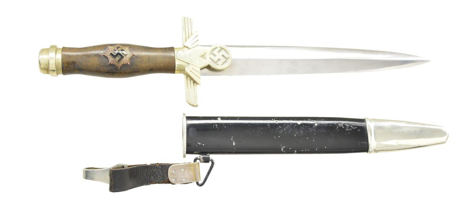 PAUL WEYERSBERG WWII GERMAN 2ND MODEL: RLB SUBORDINATE’S DAGGER. Overall length 14 3/8". Plain blade is marked on the reverse “PAUL WEYERSBERG & CO (logo) SOLINGEN”. Nickel silver cross guard featuring a large party eagle