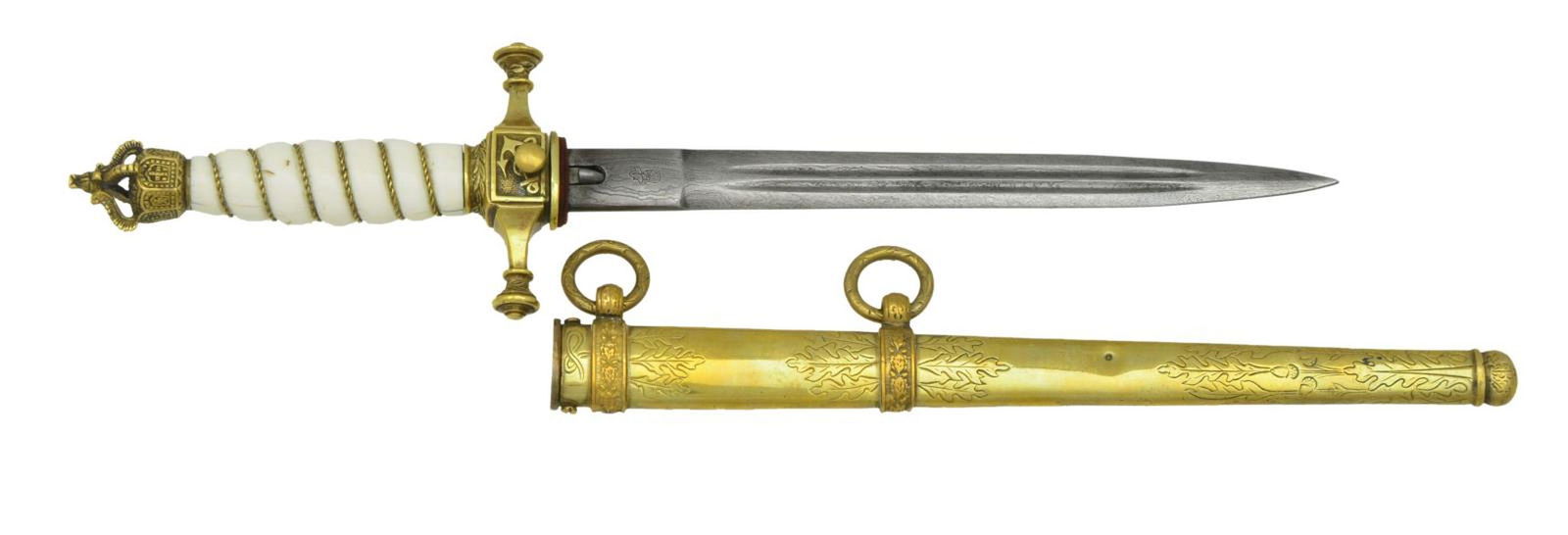 IMPERIAL GERMAN NAVAL OFFICER’S DAGGER BELONGING: TO HERMANN PFUTZNER. This fine Imperial German Navy dagger measures 14 1/2" overall with an 8” Damascus steel blade. The blade has 2 narrow fullers on each side and is stamped at the ricasso 
