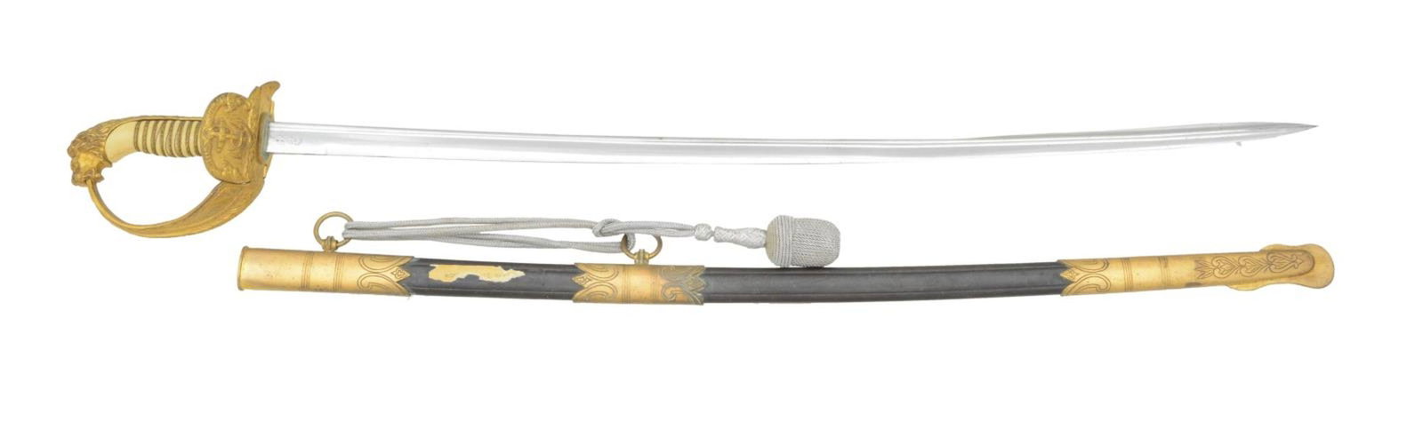 WWII GERMAN NAVAL OFFICER’S SWORD.: Overall length: 33 1/2". Blade length: 27 1/2". Plain blade with a quillback. Blade is stamped near the hilt “(knight’s head) WKC”. Gilded brass hilt with a large folding guard depic