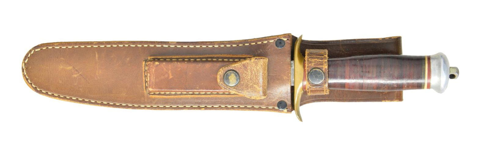 EXTREMELY SCARCE WWII ERA RANDALL SPRINGFIELD, MA: No. 1 FIGHTING KNIFE. Blade length is 7 13/16" w/ carbon steel blade w/ 1 1/2" sharpened false edge. Knife is 12 7/8" overall. Double sided curved brass hand guard. Smooth leather washer grip w/ red,