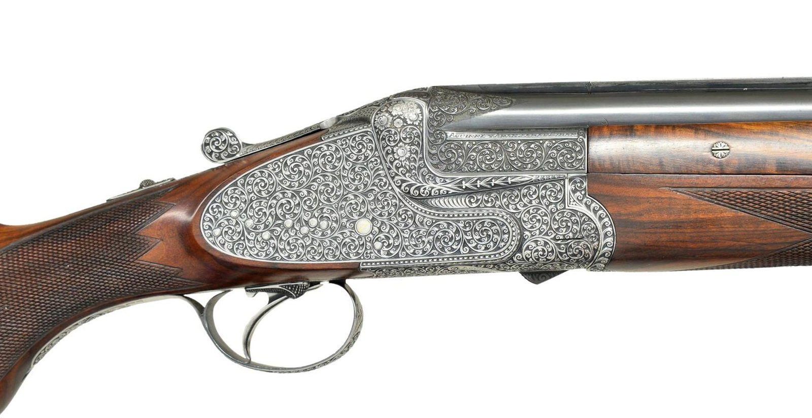 FINE AYA AUGUSTA MODEL O/U GAME GUN.: Cal. 12 Ga. 2 3/4"., S# 440754 (1974). The current retail of this model is around $30,000. This very attractive gun has 27" demi-bloc barrels with matted ventilated rib. Maker's name is on both sides 