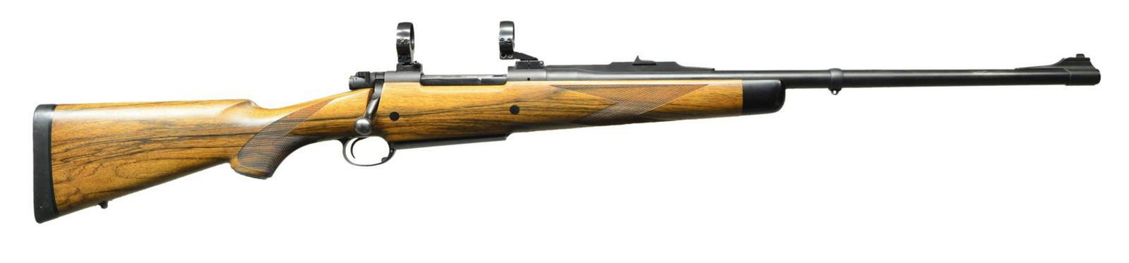 DAKOTA ARMS MODEL 76 AFRICAN GRADE MAGNUM BOLT: ACTION RIFLE. Cal. 416 Rigby S# R0610. These great rifles have become a world standard. This rifle has 24" medium weight barrel fitted with quarter rib holding one standing leaf express rear sight, sl
