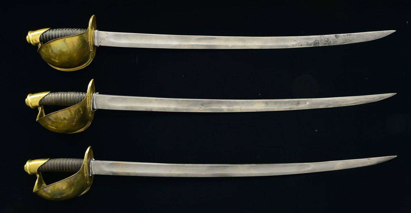 3 REPRODUCTION M1860 NAVAL CUTLASES.: All 3 cutlasses have an overall length of 31 1/4" & a blade length of 26”. Each cutlass is marked at the ricasso “Made by AMES MFG.CO. CHICOPEE MASS.” on one side, and “U.S.N. 