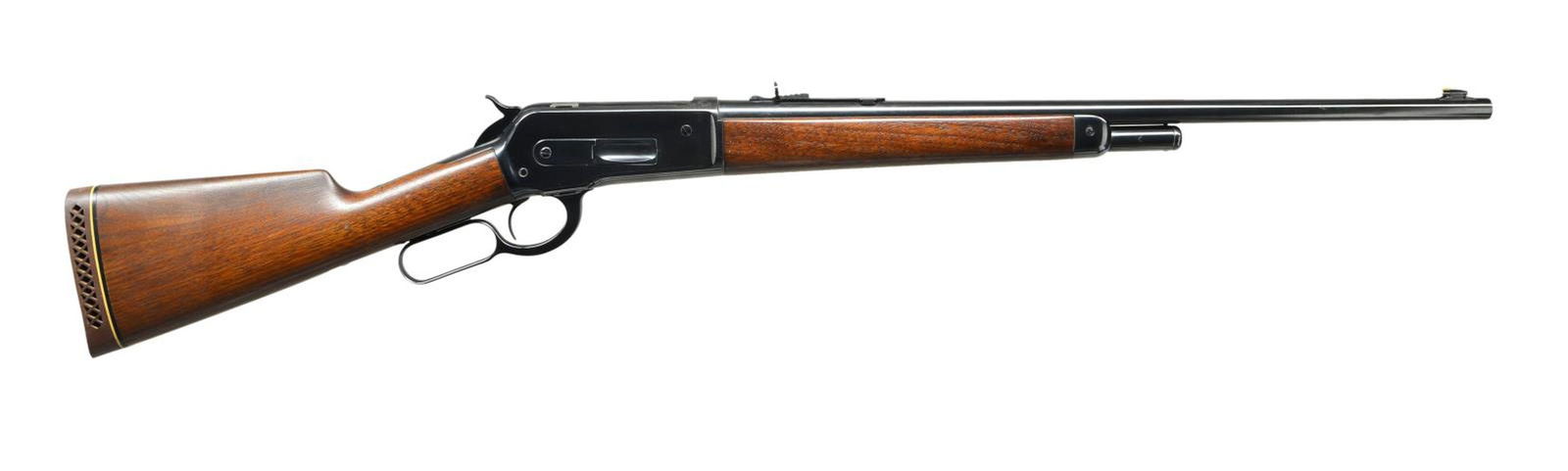 WINCHESTER 1886 EXTRA LIGHTWEIGHT LEVER ACTION: RIFLE. Cal. 45-70. S# 133554A. Bbl. 22” tapered round. Ramp mounted gold beat replacement front sight w/ original sporting rear sight. 2/3 Length mag. Left side of receiver has 2 holes w/ plug s