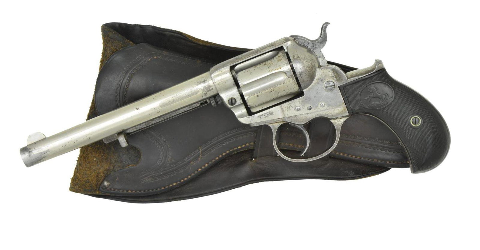 COLT 1877 THUNDERER DA REVOLVER WITH TEXAS RANGER: HISTORY. Cal. 41 Colt. S# 9490. Bbl. 6” w/ etched panel cal. marking & semicircular sight. Round six shot long flute cyl. Full nickel finish. 2 piece checkered hard rubber rampant colt grips. UN