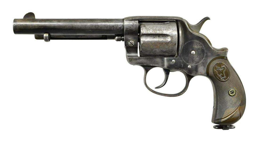 COLT MODEL 1878 FRONTIER DA REVOLVER.: Cal. 45 Colt. S# 32923. Bbl. 5-1/2’’ blade front sight. Six shot long flute cyl. Blue finish. 2 piece checkered rampant colt hard rubber grips w/ lanyard loop at butt. Mfg. 1893. CONDITION