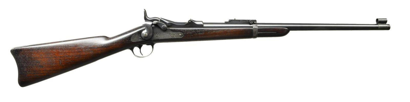 SPRINGFIELD 1879 TRAPDOOR SRC.: Cal. 45-70. S# 186906. Bbl. 22". Pinned blade front sight with slip on sheet metal hood. Carbine marked Buffington rear sight. 1873 Dated low arch breech block. Springfield marked lock. Band fastened 