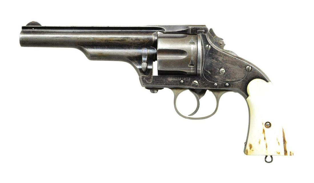MERWIN HULBERT FRONTIER ARMY LARGE FRAME DA: REVOLVER. Cal. 44-40. S# 23058. Bbl. 5 1/2” w/ rib & pinned semicircular blade front sight. Fluted six shot cyl. Blue finish w/ case colored hammer & trigger guard. Aftermarket 2 piece stag grip