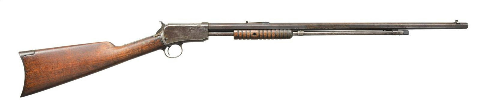 WINCHESTER MODEL 1890 PUMP RIFLE.: Cal. 22 WRF. S# 432383 A. Bbl. 24" octagon. Bead front sight with model 1890 rear sight. Tubular mag. Small round grooved forearm with straight grip walnut stock having crescent steel buttplate. 1911 