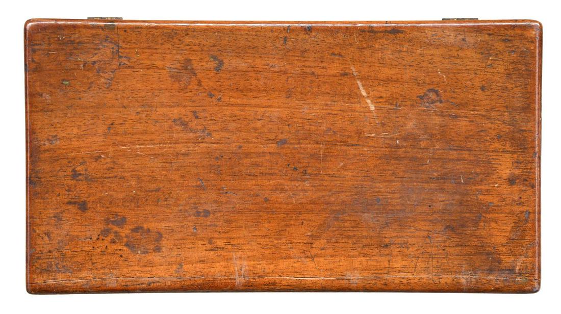 DISPLAY CASE FOR COLT 1849 POCKET REVOLVER.: 11" x 6" x2" wooden case appears to fit a 5" barrel Colt 1849 Pocket revolver. Red velvet partitioned interior contains lead bullets & balls. CONDITION: Case has good exterior varnish showing impressi