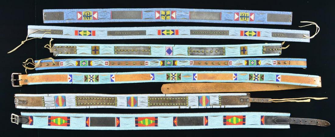 GROUP OF SEVEN AMERICAN INDIAN BEADED BELTS.: Measuring from 34" to 45", 3 belts fitted with buckles and ready to wear, other 4 need tongues and buckles sewn on. CONDITION: very good overall. PROVENANCE: From the Lifelong Collection of Glen E. Ma