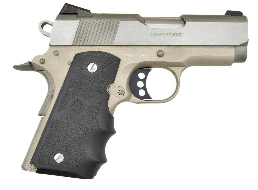 COLT STAINLESS DEFENDER LIGHTWEIGHT SEMI-AUTO: PISTOL. Cal. 45 ACP. S# DR34093. Bbl. 3 1/4" stainless. Mfg. 2008 (1998 to date) having matte nickel plated alloy frame and stainless slide. Enhancements of lowered and flared ejection port, beavertai