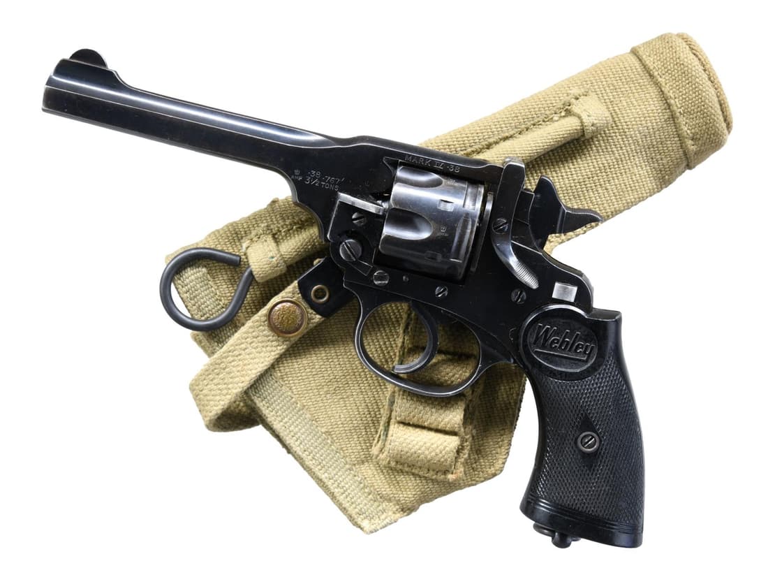 SINGAPORE POLICE MARKED WEBLEY MK IV DA REVOLVER.: Cal. 38 S&W. S# A94800. Bbl. 5" w/ import marking. All matching numbers. Rounded U-notch front sight. Fixed square notch rear sight. Back of frame marked "SPF/1783" denoting use by Singapore police fo