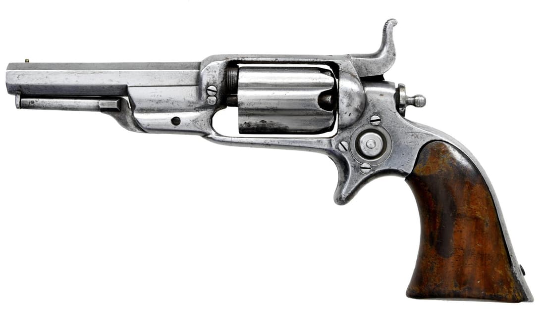 COLT 1855 ROOT MODEL 4 PERCUSSION REVOLVER.: Cal. 31. S# 1451. Bbl. 3 1/2" octagon w/ Hartford address. Full fluted cylinder, one piece wrap around wooden grips & matching S#s on butt & bottom of Bbl. flat. CONDITION: Action does not work. Hamme