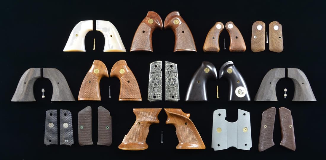 14 SETS OF HANDGUN GRIPS FOR COLT HANDGUNS.: 1-2) 2 Sets of rough cut Gabone SAA Grips w/ copy of Invoice from Colt to R. L. Wilson. 3) Colt Custom Shop SAA ebony grips w/ Custom Shop medallions & Colt logo in ivory inlay. 4) Colt Model 1903 che