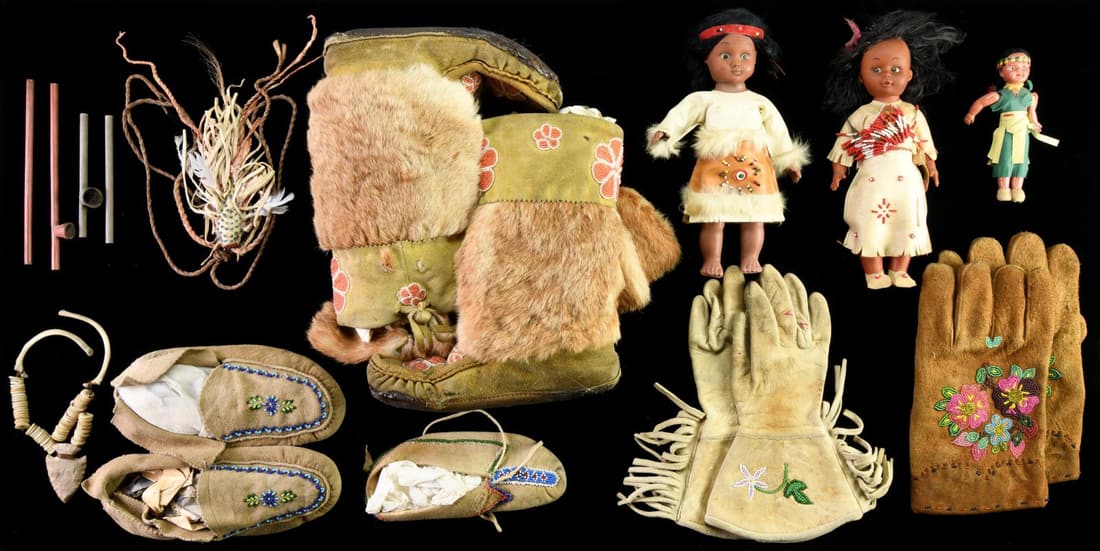 GROUP OF NATIVE AMERICAN DECORATIVE OBJECTS.: 1) Beaded "Crow Bluebird Fetish" according to label. 2) Necklace made from strung shell buttons and bones with stone arrowhead 3) Flat with 2 partial clay pipes and pipe stems 4) Pair of 9.5" blue & g