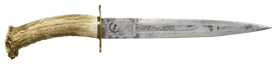LARGE 20th CENTURY MEXICAN BELT KNIFE.: Overall length: 14". Blade length: 9". The double-edged blade has a flat center with foliate engraving. There are etched markings that are unreadable on the ricasso. There is a large "1" within a circ