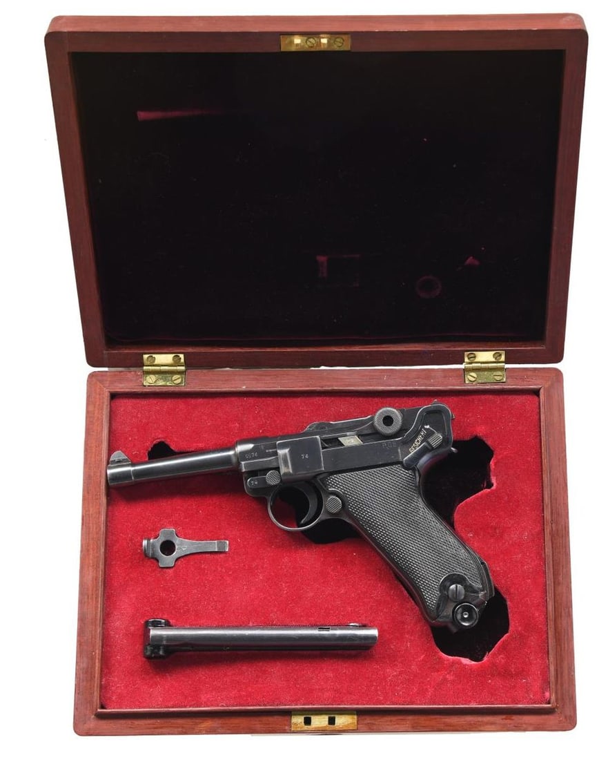 HIGH CONDITION & ALL MATCHING MAUSER "BLACK WIDOW": P.08 LUGER SEMI-AUTOMATIC PISTOL. Cal. 9mm Parabellum. S# 9974x. Bbl 4". P.08 Luger manufactured by Mauser in 1941. The receiver is stamped "41" over the chamber, with Mauser Eagle/655 waffenamts foll
