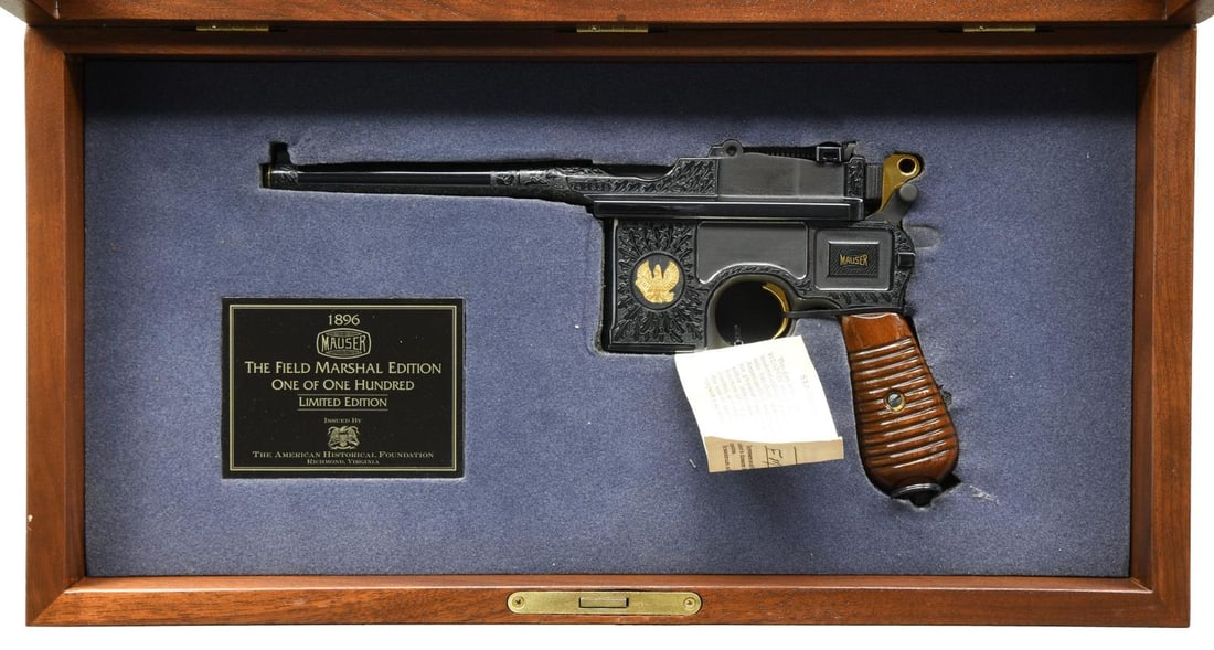 AMERICAN HISTORICAL FOUNDATION FIELD MARSHALL: COMMEMORATIVE C96 BROOMHANDLE SEMI AUTO PISTOL. Cal. 9mm Luger. S# 741835. Bbl. 5 1/2". Blade front sight. Ladder rear sight graduated to 1000m. One of only 100 C96 pistols refurbished by the American