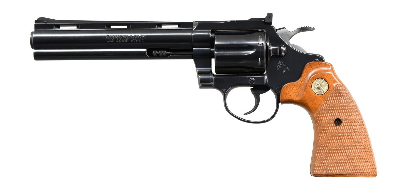 COLT DIAMONDBACK DA REVOLVER.: Cal. 22 LR. S# R56809. Bbl. 6" VR. Ramped serrated blade front sight. Adjustable rear sight. Blue finish. Checkered walnut grips w/ gold Rampant Colt medallions. CONDITION: grips show some handling ma