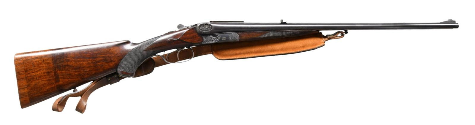 NIFTY DOUBLE RIFLE BY PETERLONGO WITH MAMMUT: VERSCHLUSS ACTION. Cal. 9.3 X 74R S# 18182. The 23 5/8" dovetailed barrels are fitted with full length matted rib holding one standing and one folding rear and silver bead front sights. A later longit