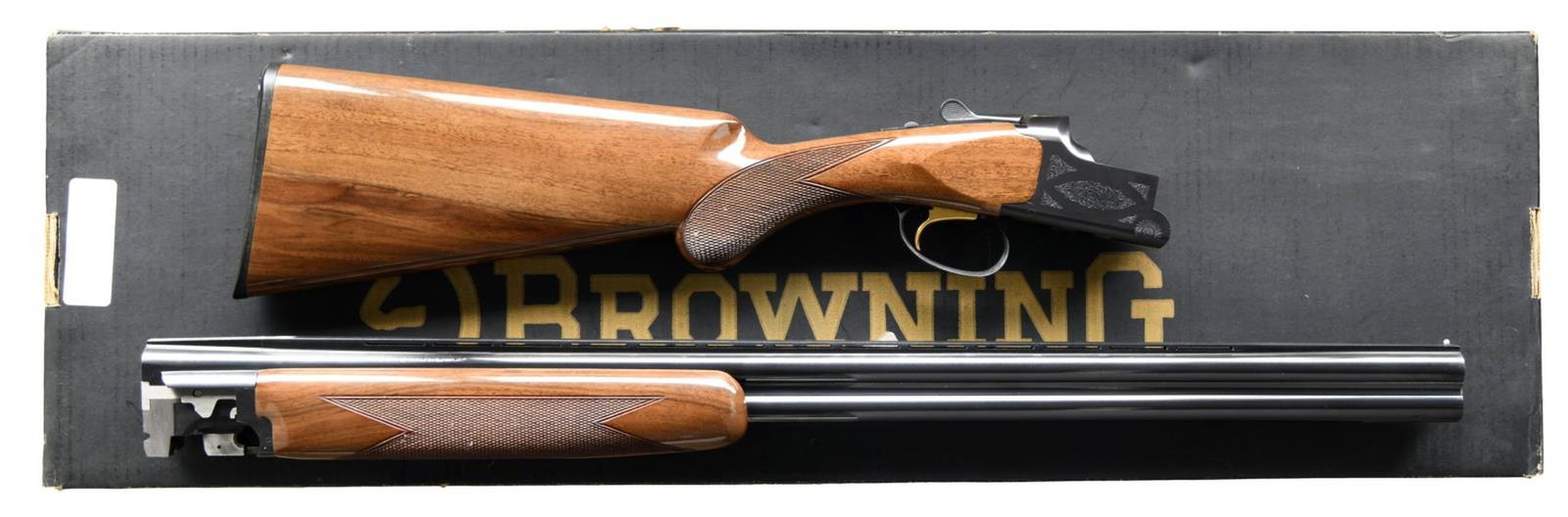 BROWNING CITORI 20 GA. LIGHTNING GRADE 1 O/U: SHOTGUN. Cal. 20 Ga., 2 3/4" & 3". S# 29977NT763 (1996). VR 28" bbls. bright bead. Fitted for Invector Plus choke tubes; Full, Mod. & IC tubes included. Boxlock action w/ rosette scroll engraving. Gol