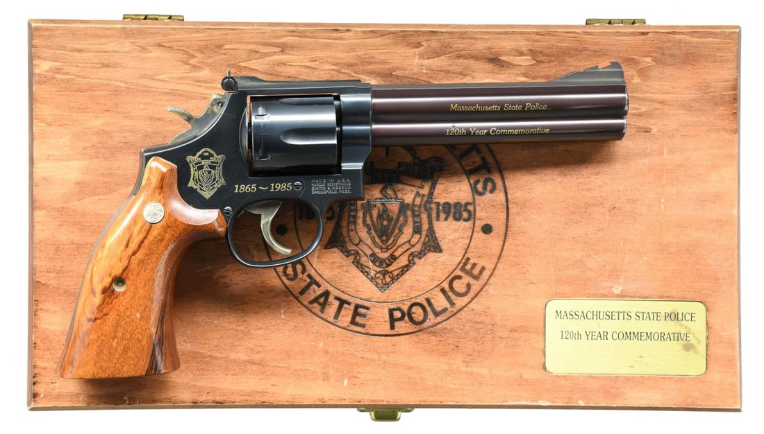 SMITH & WESSON MODEL 586 120TH YEAR MASSACHUSETTS: STATE POLICE COMMEMORATIVE REVOLVER. Cal. 357 Mag. S# AJB5131. Bbl. 6". Mfg. 1985. 1 of 631 manufactured. A special Massachusetts State Police 120th Year version of the Model 586 Distinguished Combat 