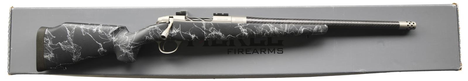 FIERCE CARBON EDGE BOLT ACTION RIFLE.: Cal. 7mm-08 Rem. S# F03S00925. Bbl. 20 threaded w/ detachable muzzle brake. Receiver has Weaver style scope bases. Bbl. has dark gray pebbled finish. Balance of metal has matte stainless finish. Black
