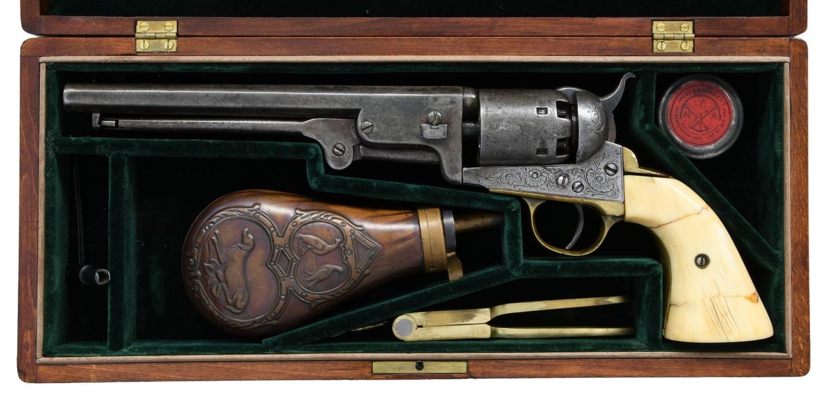 CASED ENGRAVED COLT BREVET MODEL 1850 NAVY: REVOLVER WITH IVORY GRIPS. Cal. 36. S# 13027. 7.75? tapered octagonal barrel engraved in block letters: ?ADDRESS SAML COLT NEW YORK CITY?. Barrel markings not by Colt, and neither are ?COLTS PATENT? o
