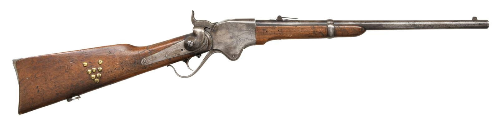 SPENCER MODEL 1865 COLORADO TERRITORY MARKED: SRC. Cal. 56-50. SN. 9689. Bbl. 20" with blade front & leaf rear sight. Case colored action is fitted with the Stabler cutoff & has a saddle ring & bar on the left side. 7 round tubular mag inserts th