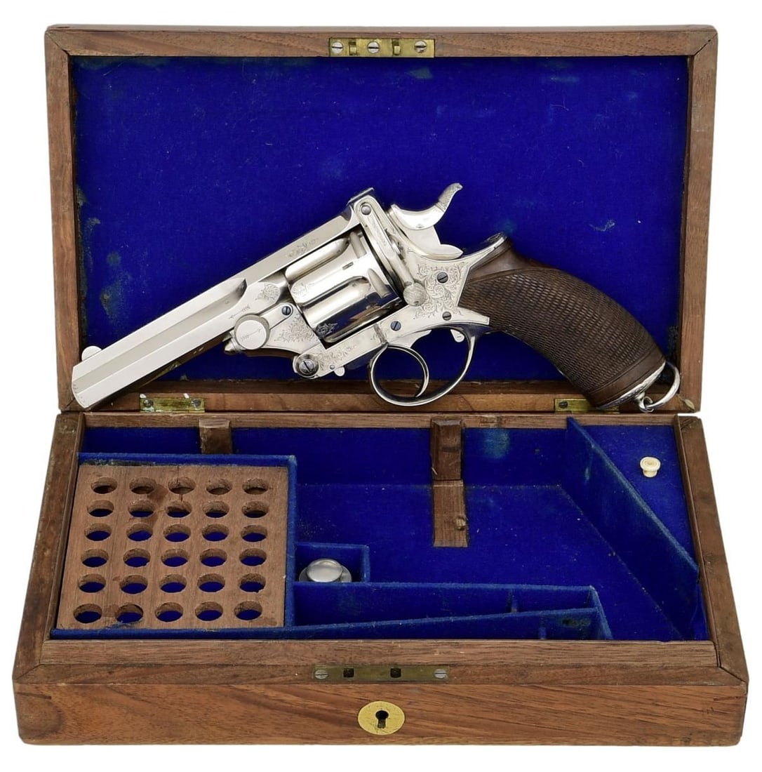 FINE CASED & ENGRAVED WEBLEY PRYCE NICKEL PLATED: REVOLVER RETAILED BY WESTLEY RICHARDS. Cal. 455 Eley (?). S# 10 (on face of frame). The Webley Pryce was the first successful design for a top break, double action, self extracting revolver by Webley.