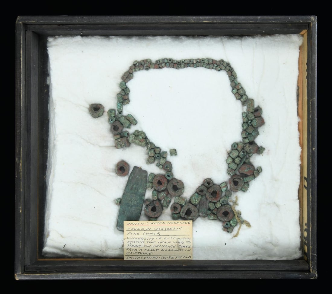 PRE-CONTACT WISCONSIN COPPER CULTURE NATIVE: AMERICAN NECKLACE. This extraordinary necklace consists of the excavated remains of a pre contact, native copper, beaded necklace found many years ago in the Great Lakes region. The necklace consists
