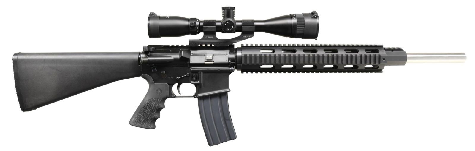 DPMS A15 RIFLE WITH 20" HEAVY BARREL.: Cal. 223. S# F201906. Bbl. 20". .092" stainless heavy barrel w/ 1/9 rifling. Low profile gas block. 12" free floating quad rail. Flat-top upper receiver w/ round forward assist & brass deflector. Curr