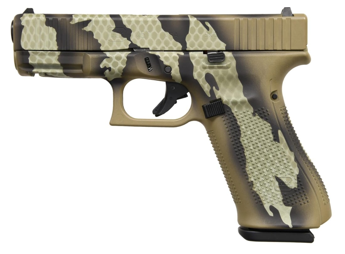 GLOCK 45 SEMI AUTO PISTOL.: Cal. 9mm Luger. S# AFHP200. Bbl. 4". Standard white outline Glock sights. Riptile camoflauge finish on side & frame. Slide has front & rear serrations. Ambi slide release. Enlarged mag release. Polyme