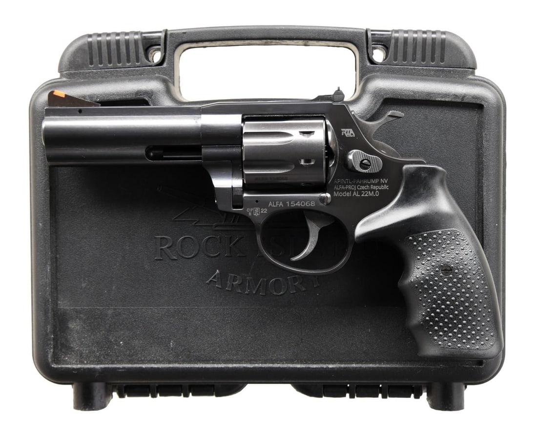 ROCK ISLAND ARMORY AL22M.0 DA REVOLVER.: Cal. 22 WMR. S# ALFA154068. Bbl. 4". Ramped blade front sight w/ orange insert. Adjustable rear sight. Czech made revolver imported by Rock Island Armory. Blue finish. Black finger groove grips. UNATT