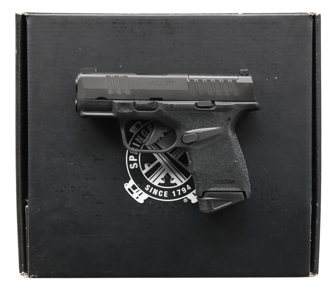 SPRINGFIELD ARMORY HELLCAT SEMI AUTO PISTOL.: Cal. 9x19. S# BA340263. Bbl. 3". Yellow dot tritium front sight. White outline u-notch rear sight. Slide has factory cut for RMR plate for red dot sight mounting. Matte black finish. Polymer frame w/ 