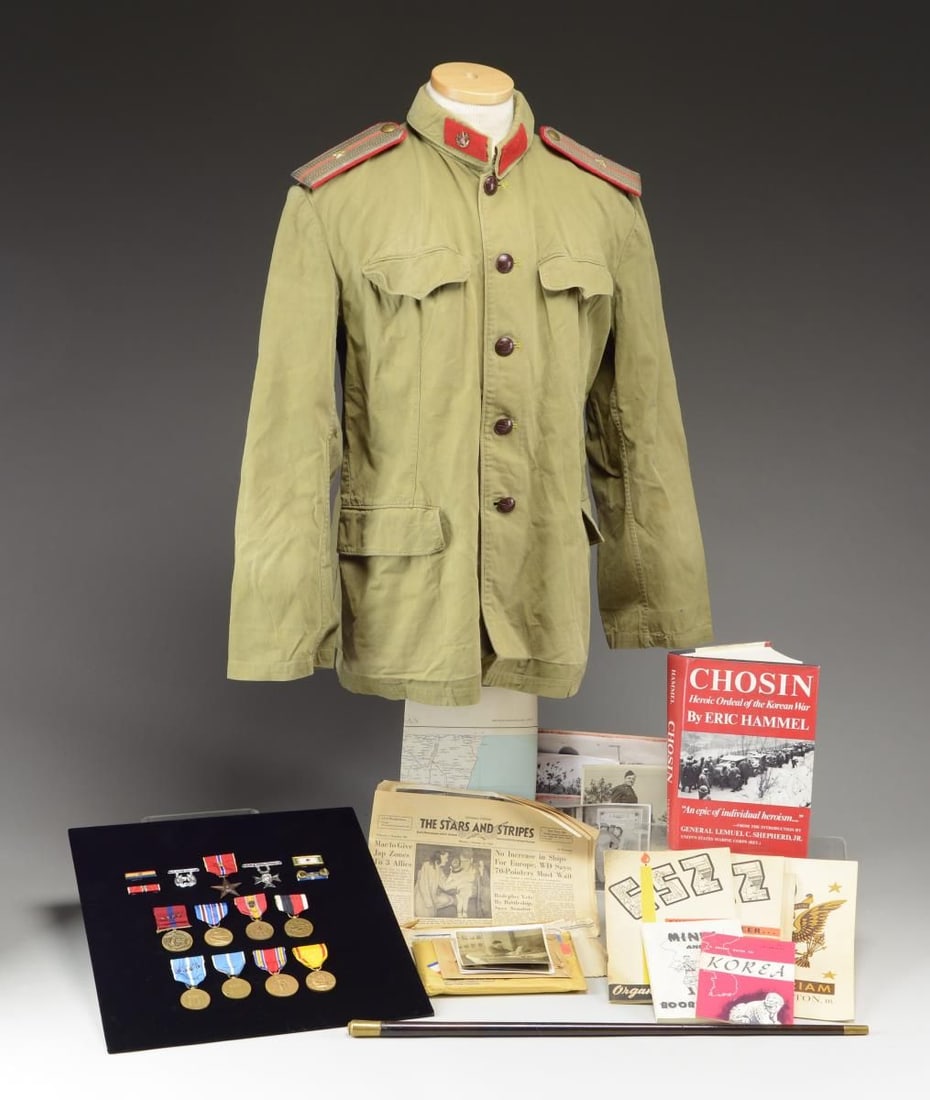 KOREAN WAR GROUP BELONGING TO CORPORAL RICHARD: CARROLL OF THE MARINE CORPS. This group includes 1 North Korean Officer's uniform coat in OD cotton. Uniform has 5 dark brown plastic buttons down the front bearing a star with a Korean letter in the