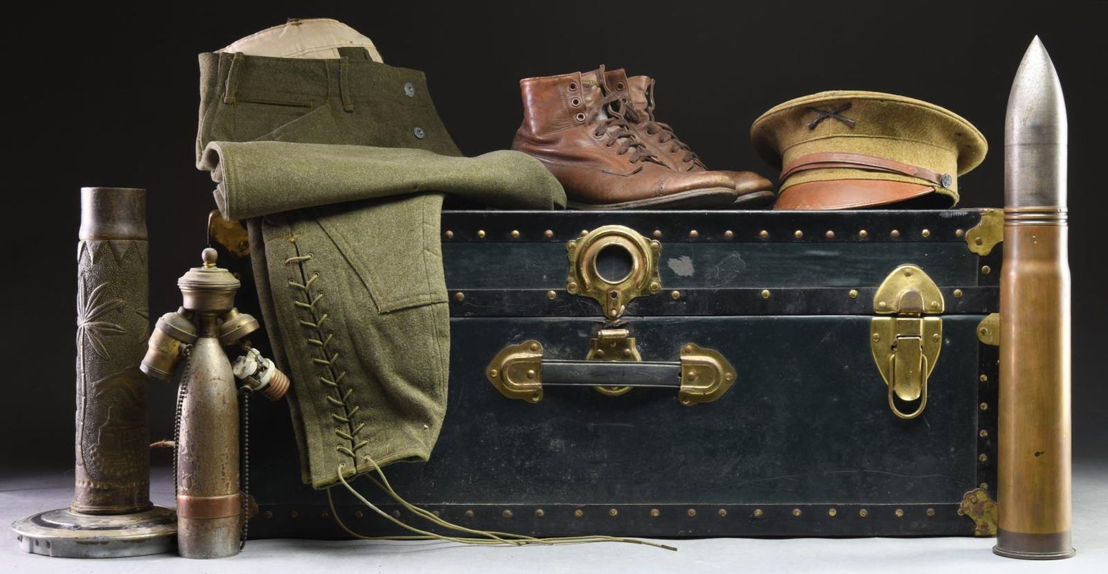 WWI ERA MAINE UNIFORM GROUP & 6 LB. CANNON SHELLS.: This lot consists of a WWI era Maine National Guard uniform for a Corporal. The uniform group includes tunic, pants, brown leather boots, leather puttees, canvas puttees, wool leg wraps, a heavy wool 