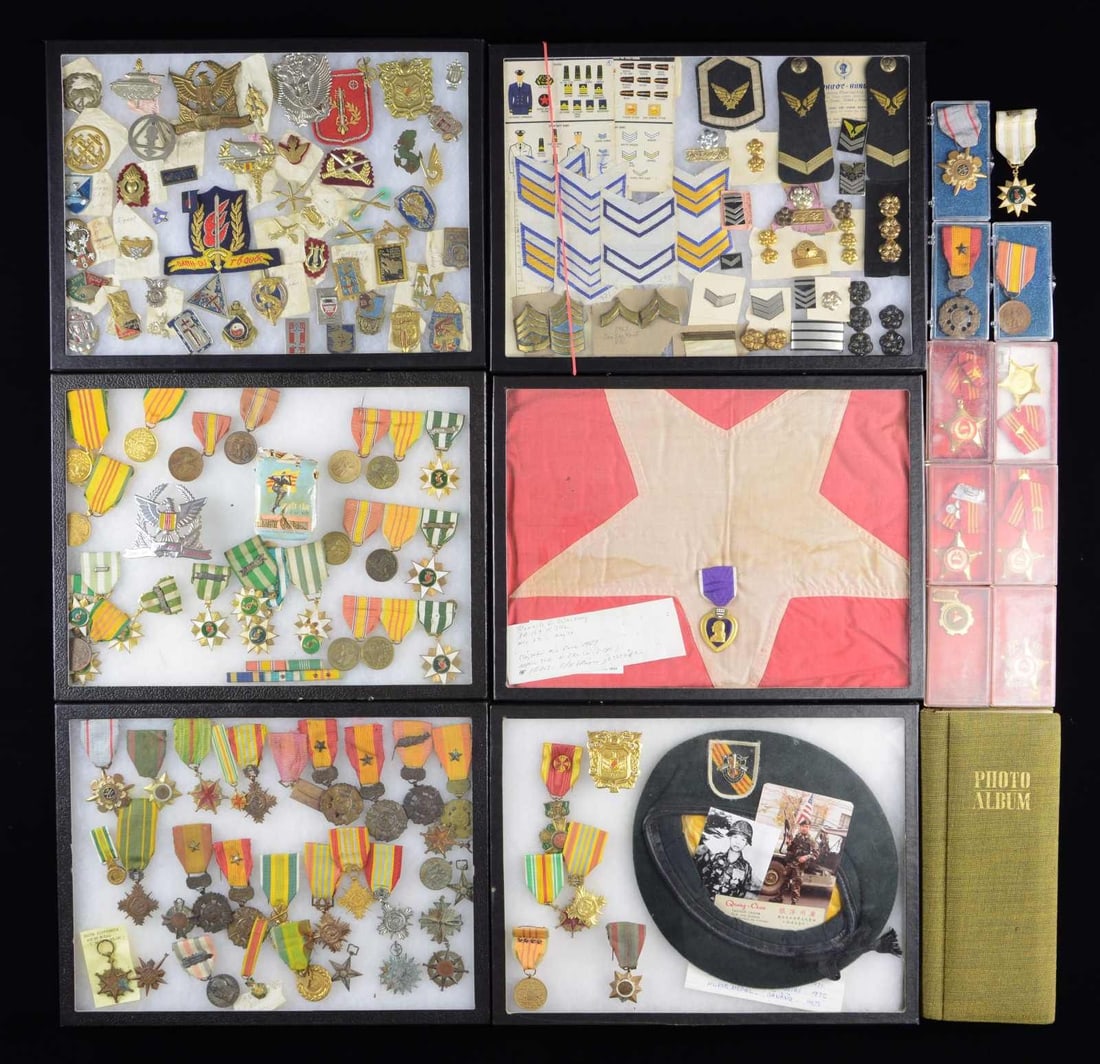 LARGE LOT OF NORTH & SOUTH VIETNAMESE MEDALS &: INSIGNIA WITH VARIOUS US MEDALS & RELATED MATERIAL. This huge lot consists of 75+ North Vietnamese medals & badges of various types & styles. / 35+ South Vietnamese medals of various types & styles. /