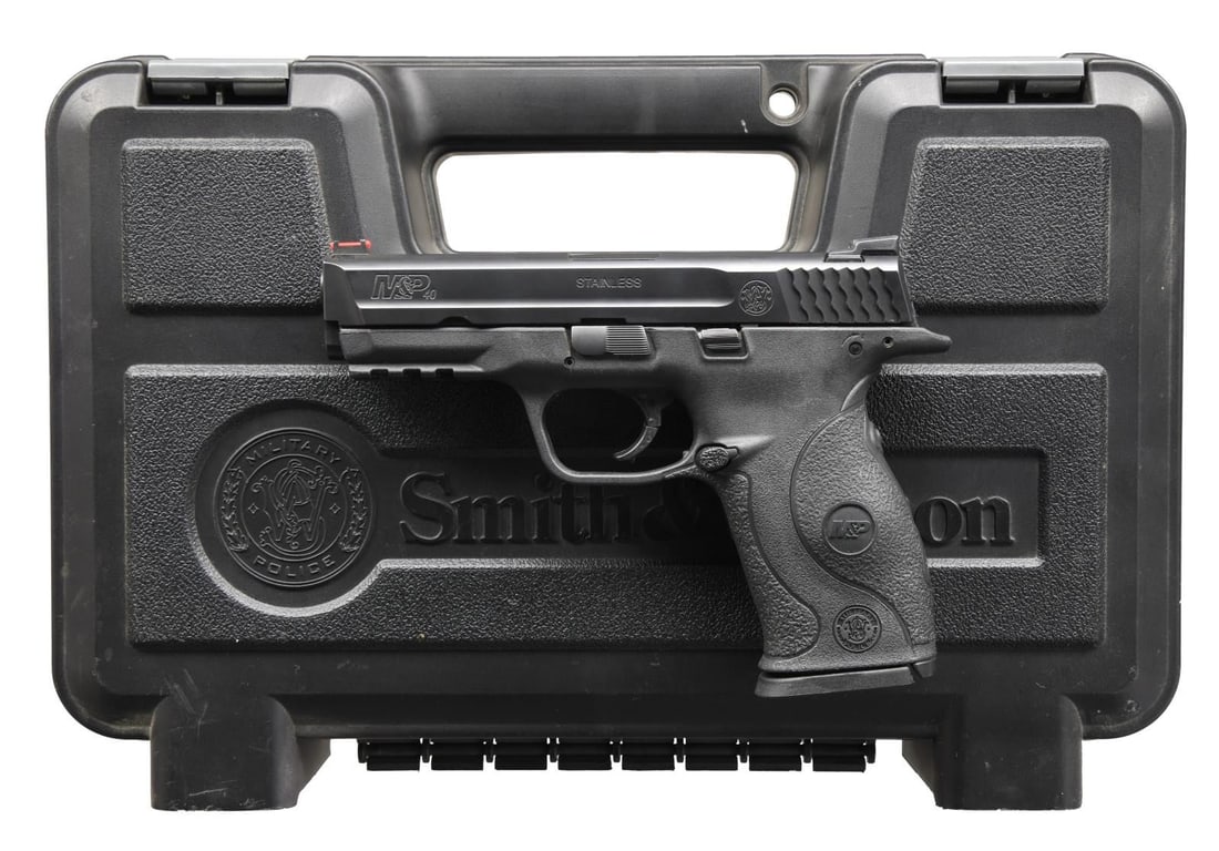 SMITH & WESSON M&P CT SEMI AUTO PISTOL.: Cal. 40 S&W. S# DUF9325. Bbl. 4 1/4". Fiber optic front sight. White dot rear sight. Ambi slide release. Matte black finish. Polymer frame w/ accessory rail. Crimson Trace Laser grips. MAGS: 1-15 rd. 