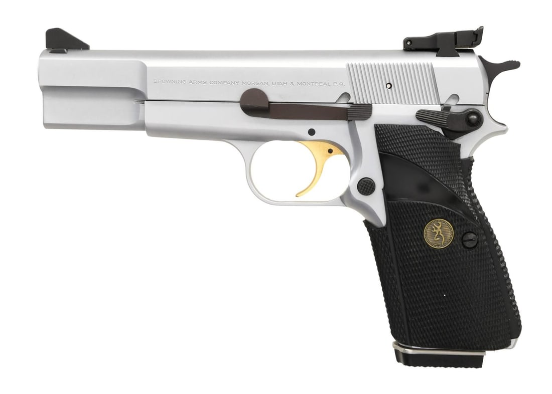 BROWNING HI POWER SEMI AUTO PISTOL.: Cal. 9mm. S# 245NW81304. Bbl. 4 5/8". Serrated ramp blade front sight. Adjustable rear sight. Assembled in Portugal w/ Belgian parts. Hard chrome finish w/ gold trigger. Ambi safety. Pachmayr Signatur