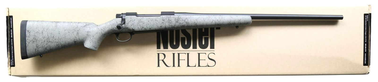 NOSLER M48 LIBERTY BOLT ACTION RIFLE WITH MATCHING: FACTORY BOX. Cal. 300 Win Mag. S# N03824. Bbl 24". M48 Liberty bolt action rifle mfg. by Nosler. Left side of bbl. is marked with the cal. designation, with "Nosler M48" and "BEND, OREGON" on the left