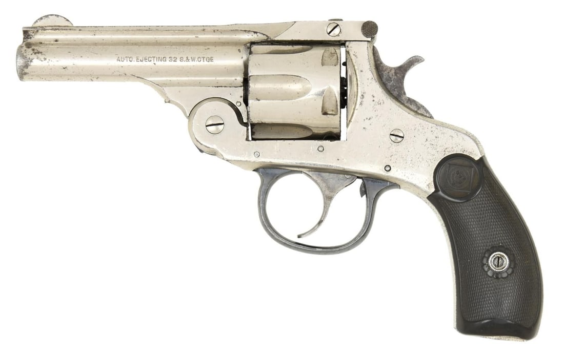 H&R TOP BREAK DA REVOLVER.: Cal. 32 S&W. S# 100845. Bbl. 3". Round blade front sight. Fixed rear sight. Right side of bbl marked "AUTO EJECTING 32 S&W CTG". Last patent date on bbl. is April 7th, 1896. Nickel finish. Target logo