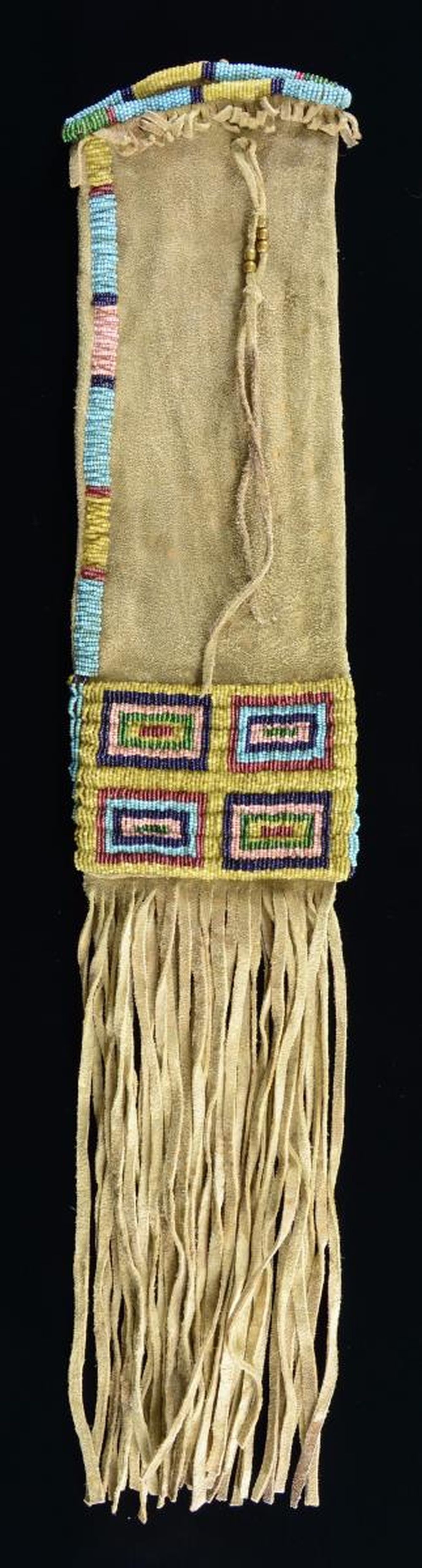 FINE DECORATIVE AMERICAN INDIAN PIPE BAG.: 26" including fringe x 5.25", thread sewn beaded throat & 4" x 5.25" panel beaded with yellow ground, blues, pink, and red. CONDITION: very good. (02-21002/JS). $500-600.