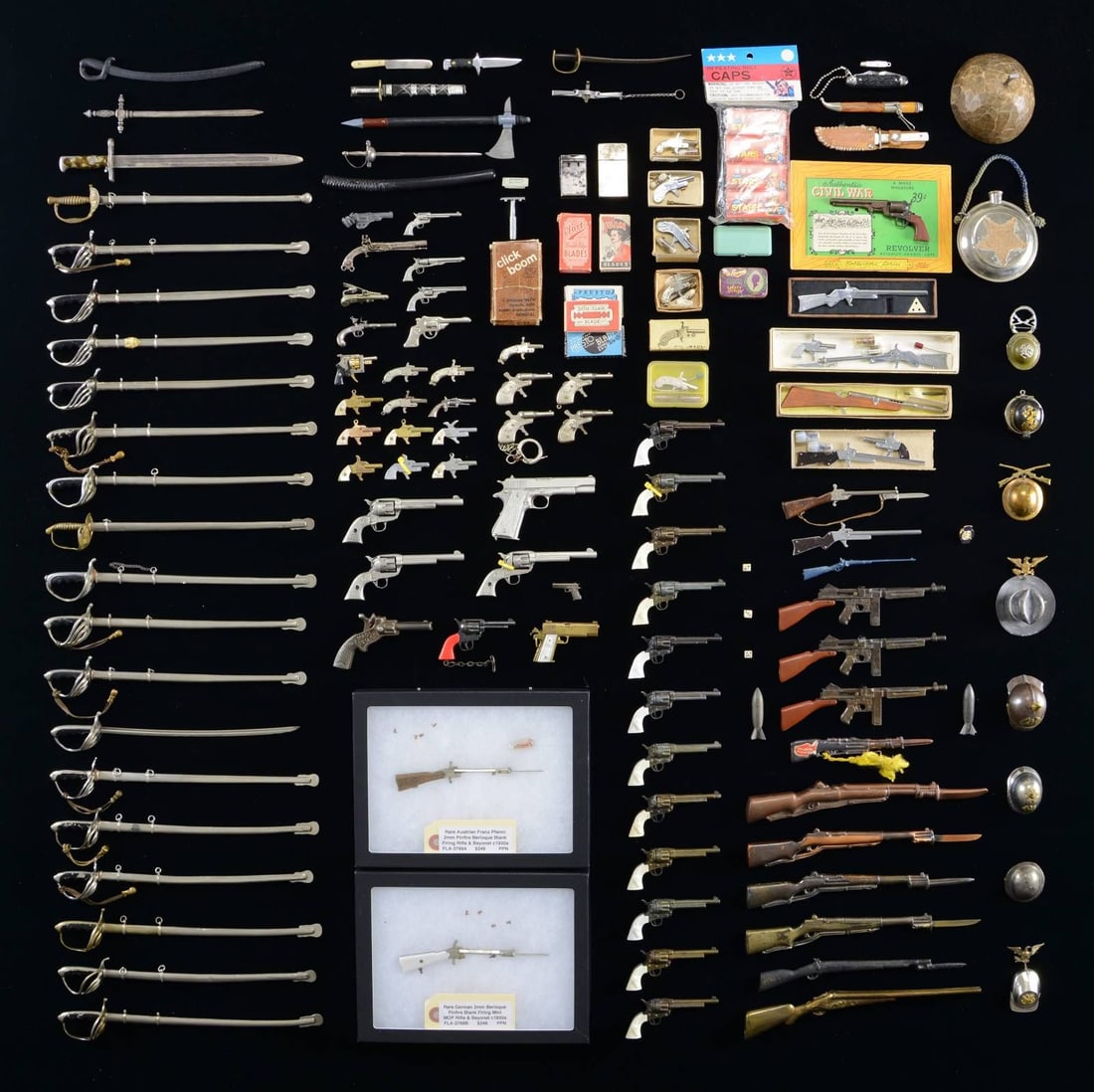 LARGE GROUPING OF MISCELLANEOUS MINIATURE: FIREARMS, SWORDS, KNIVES, & TRINKETS. 1) MINIATURE FIREARMS. Numerous miniature display firearms from a variety of periods including: replica Colt Single Action Army revolvers, Thompson submachine gun